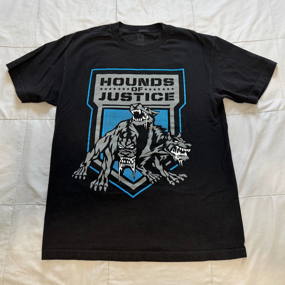 WWE Shop THE SHIELD “Hounds of Justice” Authentic S/S T-Shirt Reigns Ambrose